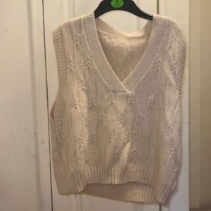 Hello cuties. We have a medium cream crew neck sweater. Great for layering.